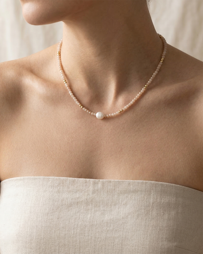 Lychee Pearl Crystal necklace worn by a person with a neutral background